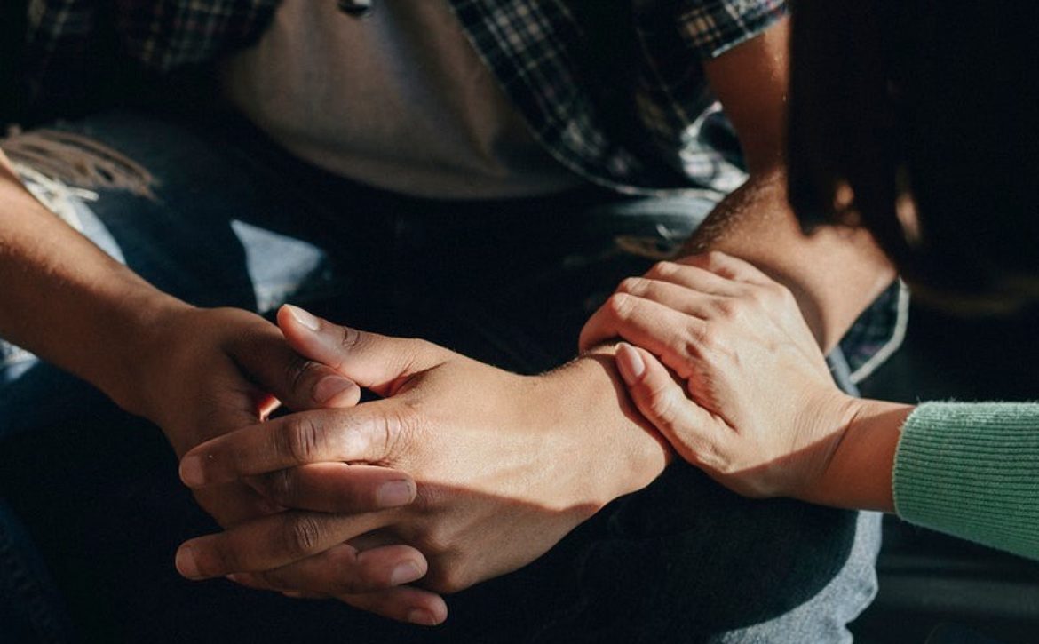 People support each other in a rehab session