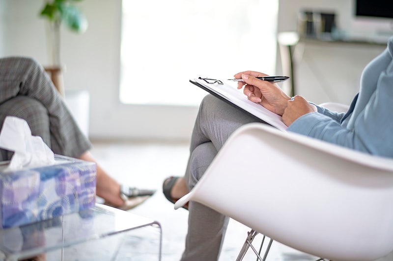 Businesswoman holding a personal notebook