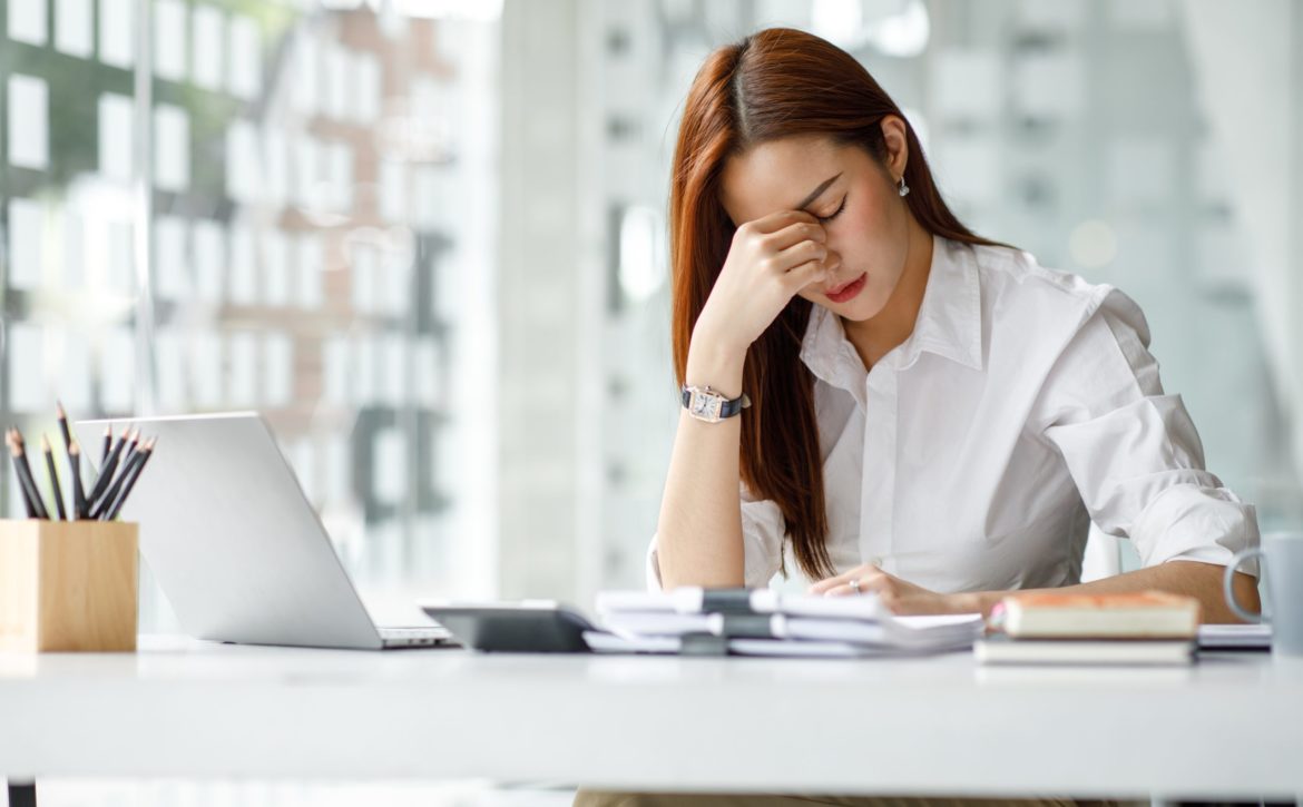 Asian,Women,Are,Stressed,While,Working,On,Laptop,,Tired,Asian