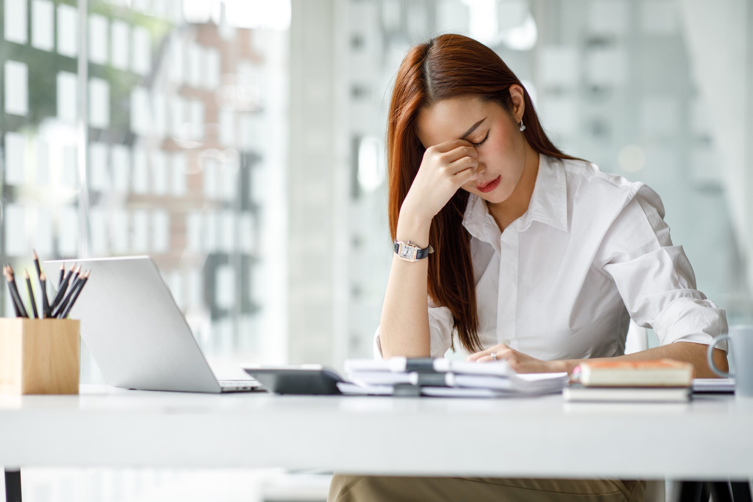 Asian,Women,Are,Stressed,While,Working,On,Laptop,,Tired,Asian